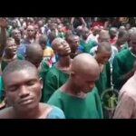 A Video making rounds online shows inmates in a Nigerian prison joining Christian missionaries